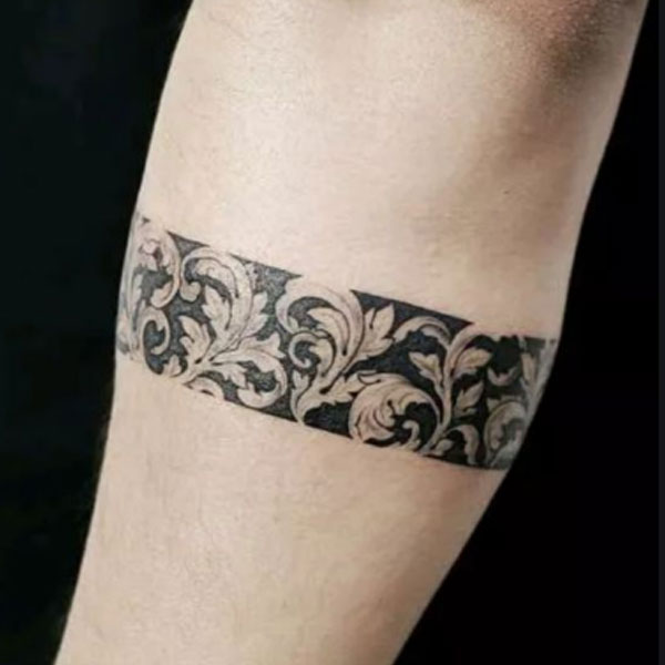 negative shading armband tattoo