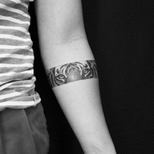 lion armband tattoo