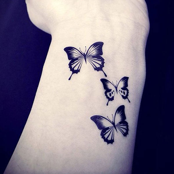 Beautiful Black and Grey Butterflies Tattoo on Wrist 