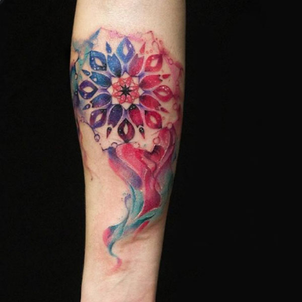 Very decorative colorful mandala tattoo design