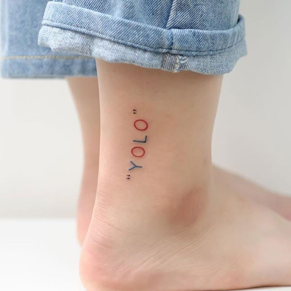 Trendy YOLO word colorful tattoo  
