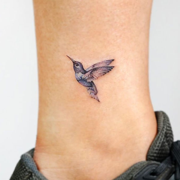 Beautiful small Bird tattoo design