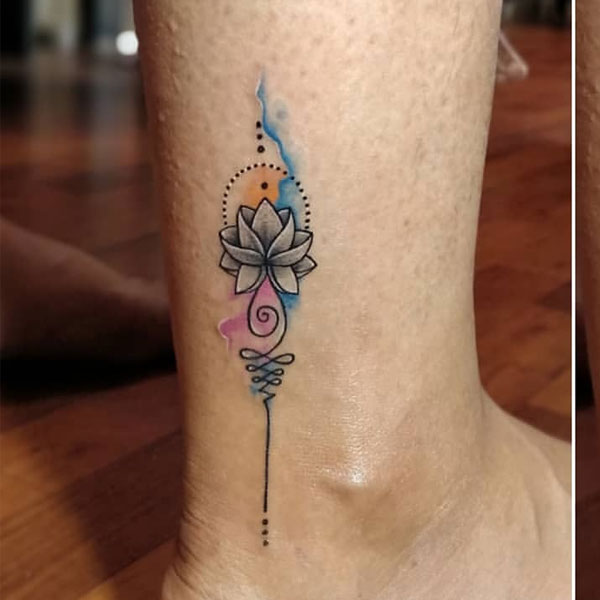 Appealing colorful lotus Unalome tattoo