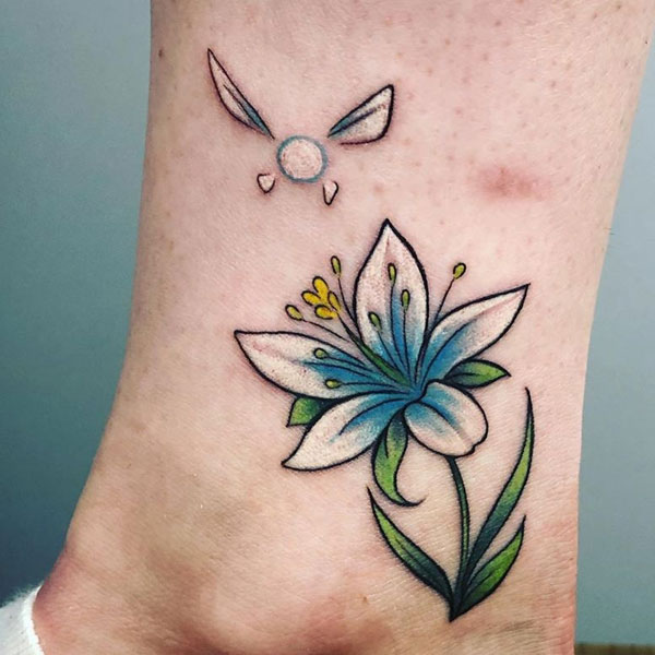 Gorgeous Small lily flower tattoo
