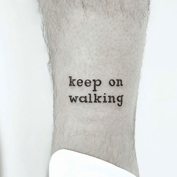  Beautiful script ankle tattoo keep on walking