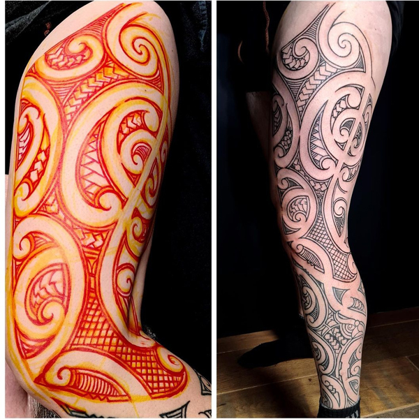 Freehand Maori side leg tattoo