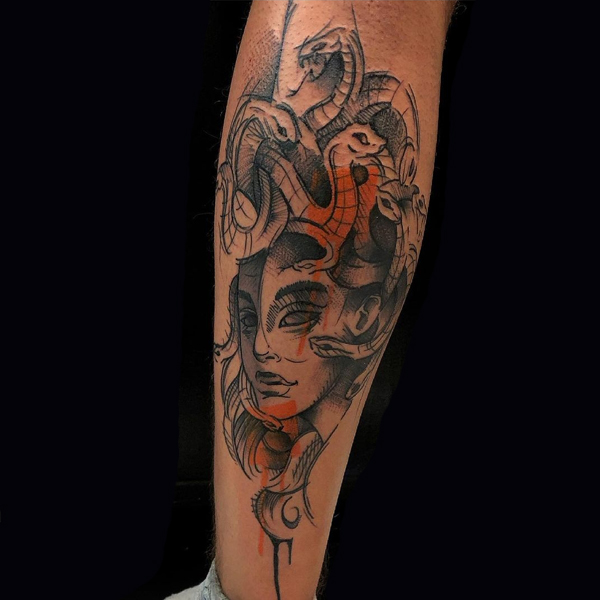 Creative women and snake medusa side leg tattoo 