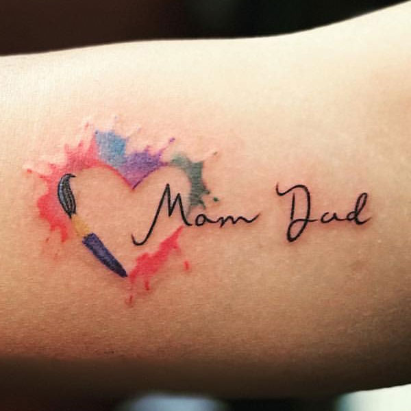 Creatively designed mom dad colorful tattoo