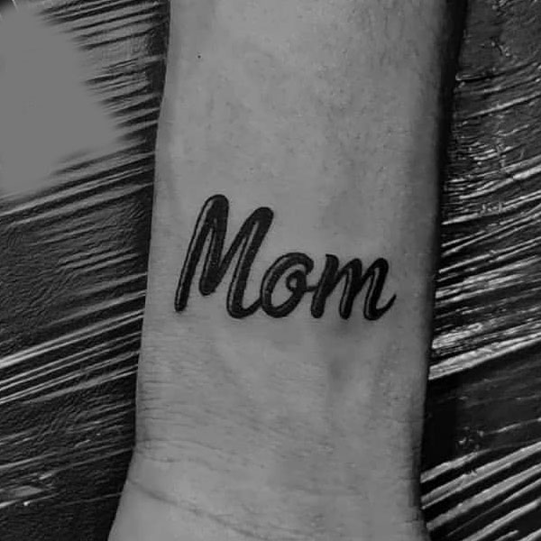 Small bold Mom tattoo
