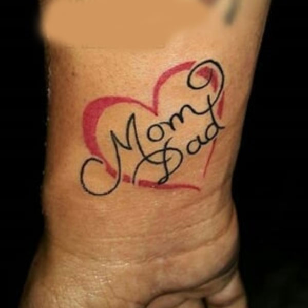 Stunning Mom Dad inside heart tattoo
