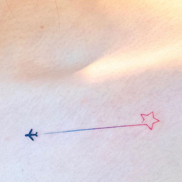 Minimal cute plane star tattoo