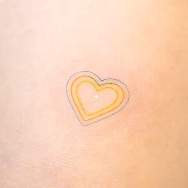 Little small heart shape colorful line tattoo