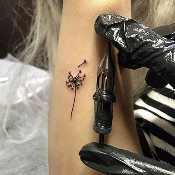 Black cute sexy dandelion lower tattoo