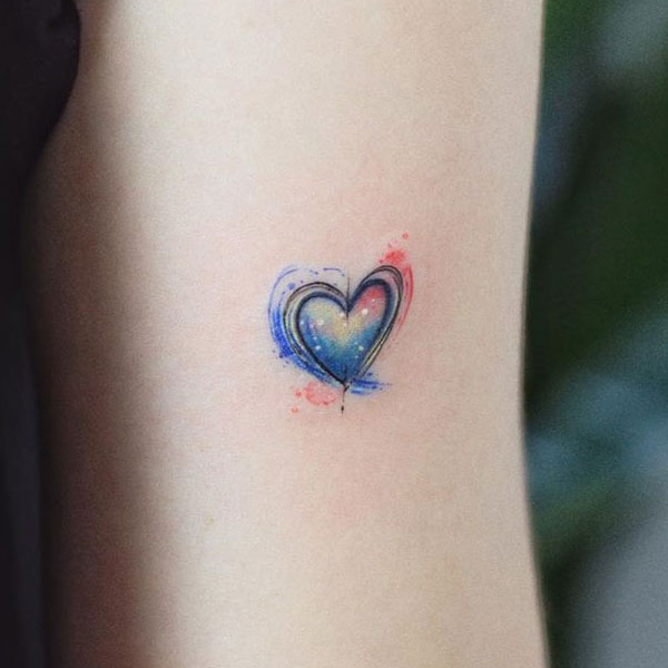 Stunning small color effect heart tattoo 