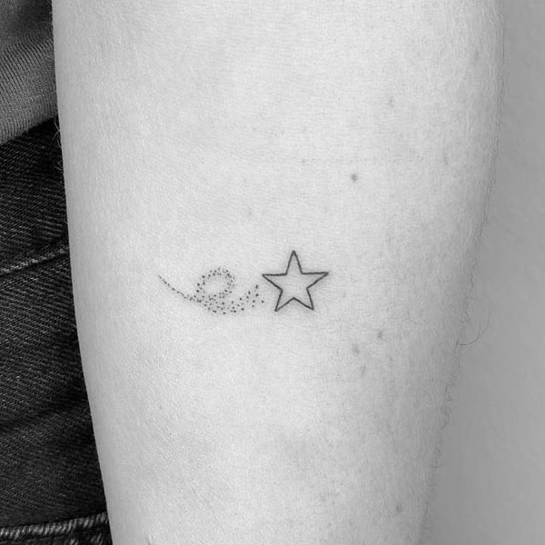 Small darling star tattoo