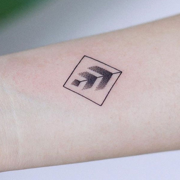 Creative small symbol tattoo