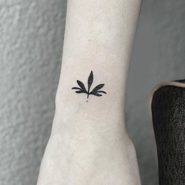 Black cute lily flower symbol tattoo