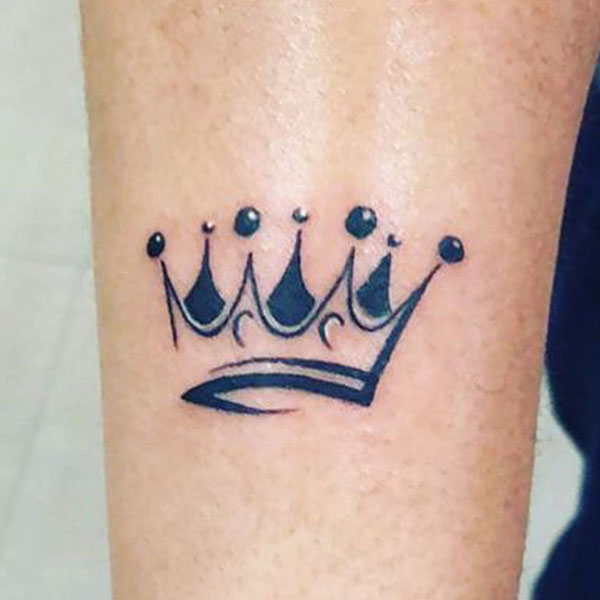 Black Beautiful crown tattoo on hand