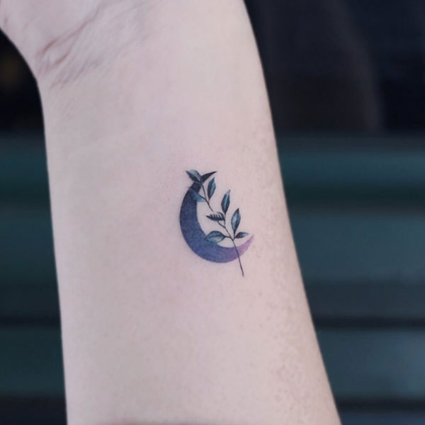  Elegant small moon leaves tattoo