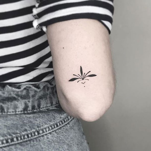 Amazing tiny leaves tattoo