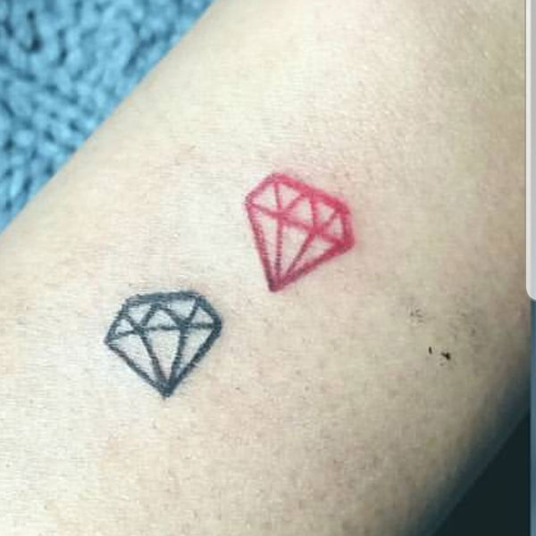 Small Red and black diamonds tattoo for hand