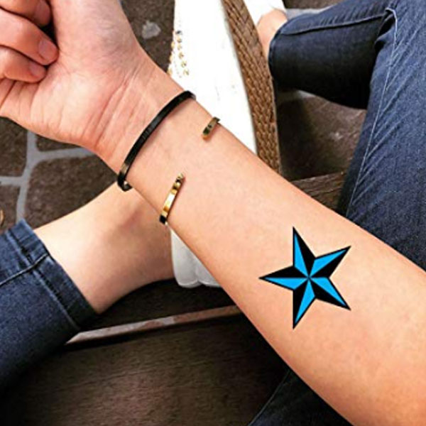 Blue nautical Star bold tattoo