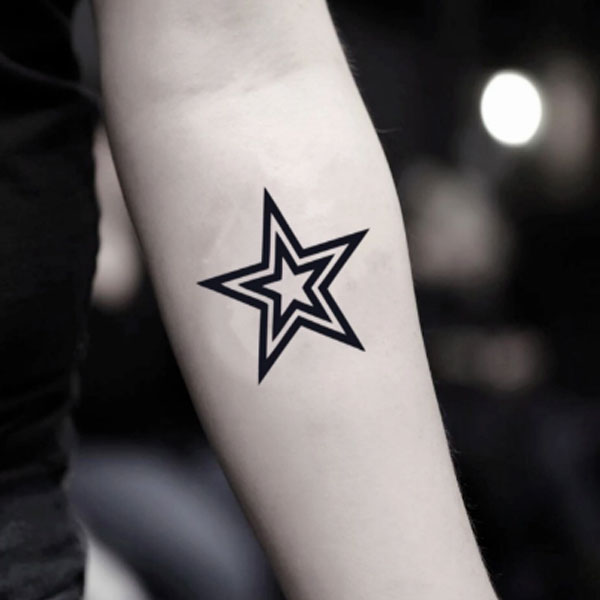 Dashing Tribal Star tattoo 