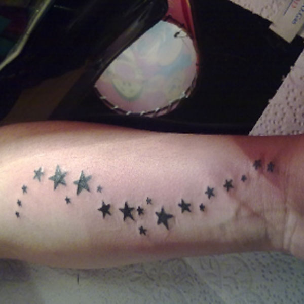 Tiny shooting star cute tattoo