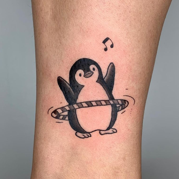 Cute small hula hoopin pengu birds tattoo