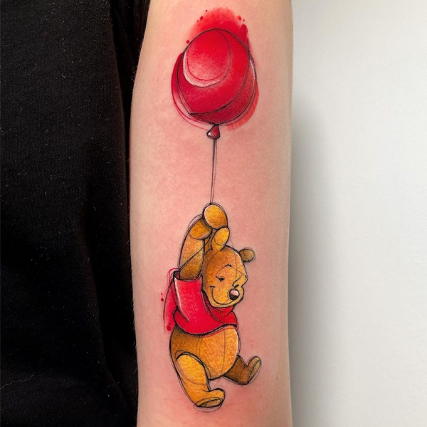 Small Winni the poo tattoo