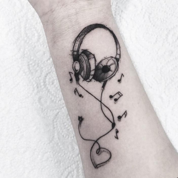 Amazing headphone with musical note tattoo