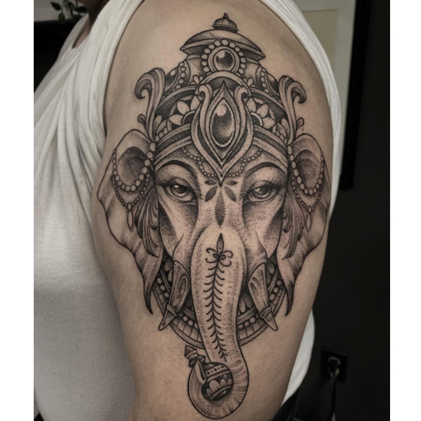 Sacred Lord Ganesha black and grey tattoo