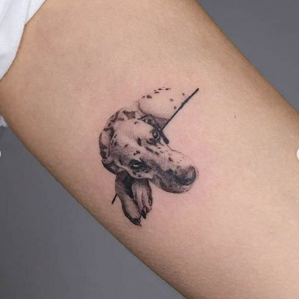 A lazy Dalmatian dog tattoo