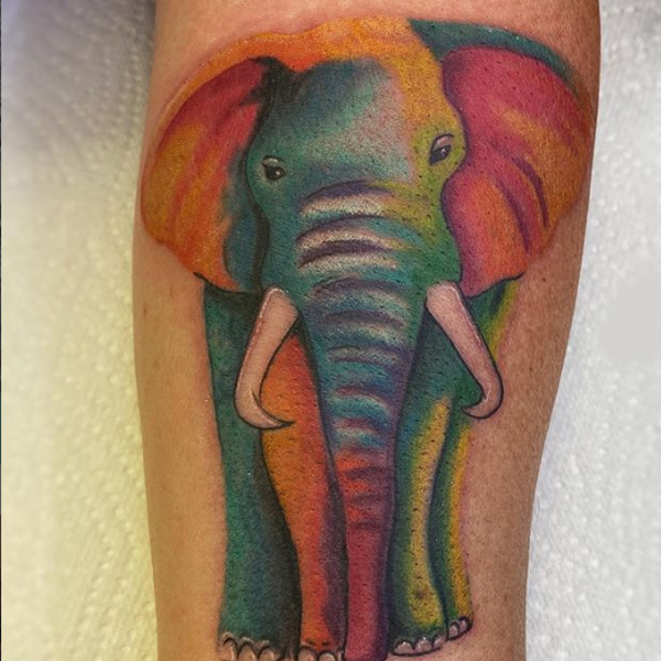 Amazing radiant elephant tattoo