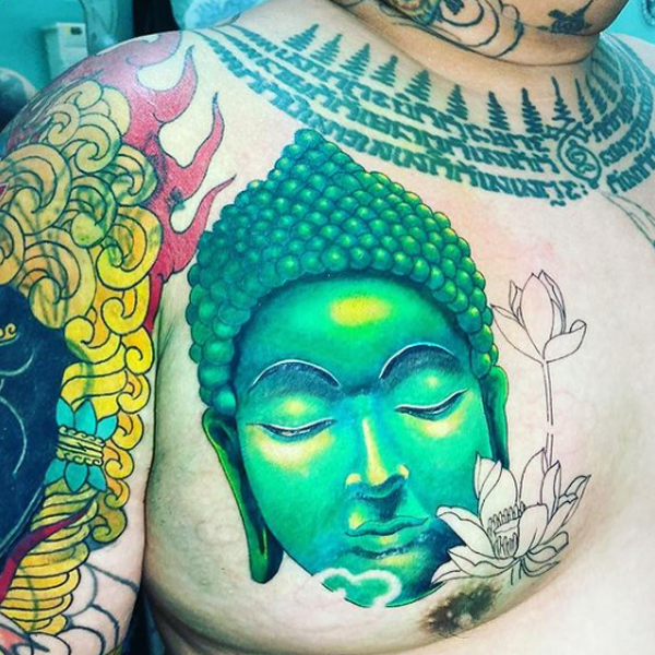 Fabulous Buddha colorful face on the chest