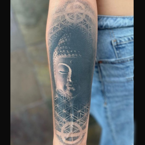 Amazing buddha portrait and geometrical pattern tattoo