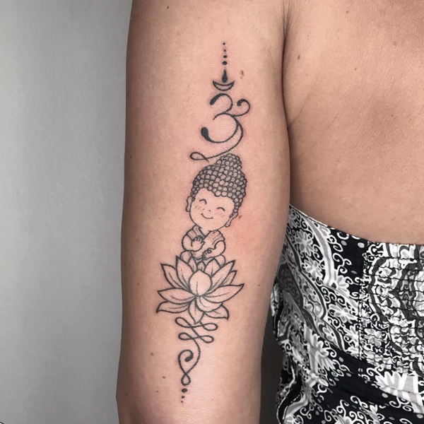 A little cute buddha and lotus tattoo design