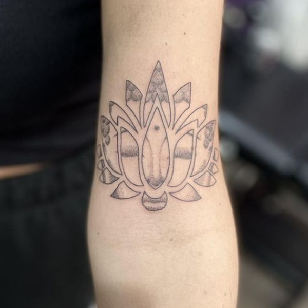 Amazing buddha lotus design tattoo