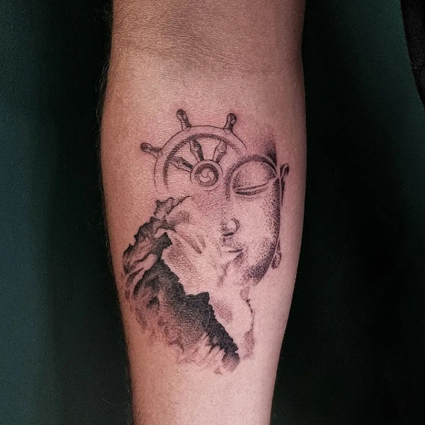 Pretty buddha and dharmchkra tattoo