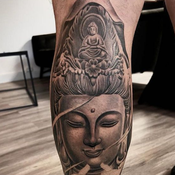 Pretty buddha and dharmchkra tattoo