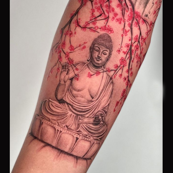 Amazing micro realism buddha and cherry blossom flower tattoo