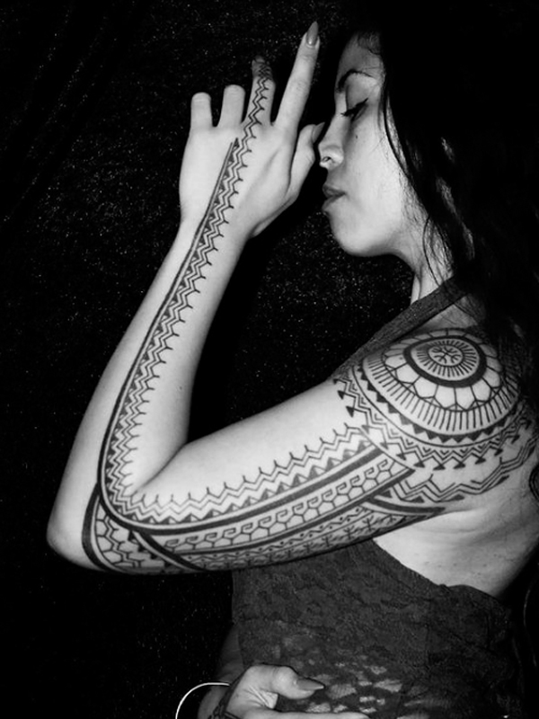 Gorgeous Full arm Maori design tattoo for female