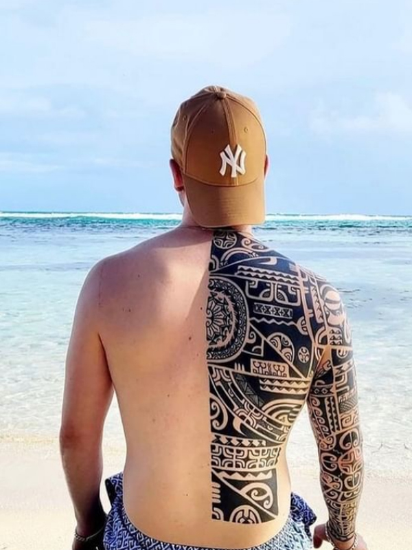 Fantastic Maori half-back piece tattoo