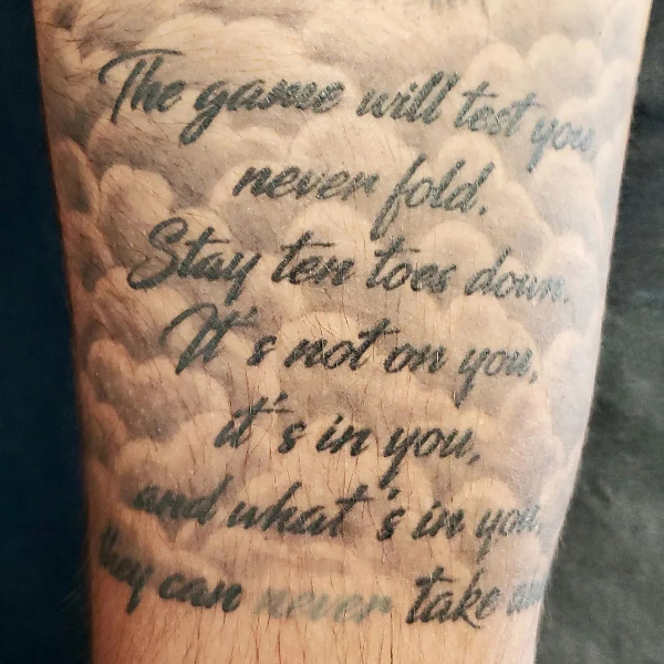 Splendid Shadding clouds with quote design tattoo
