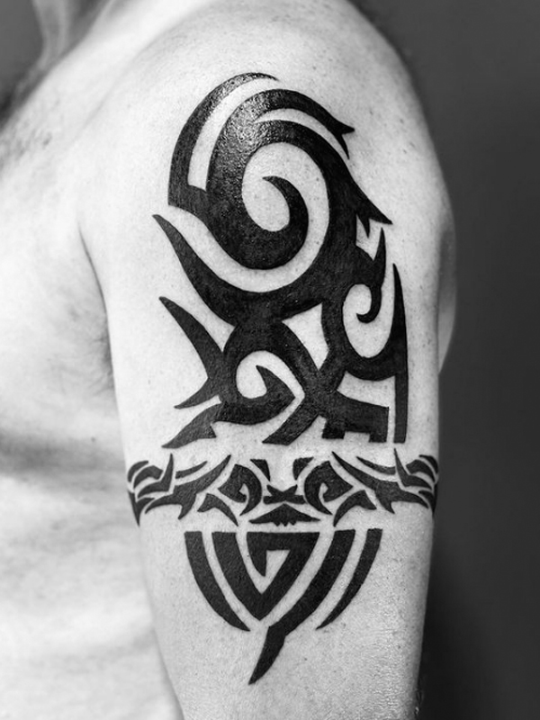  Dazzling black bicep tribal band tattoo