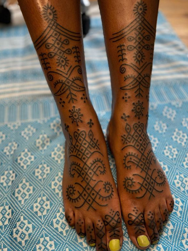 Ornamental tribal tattoo design for female