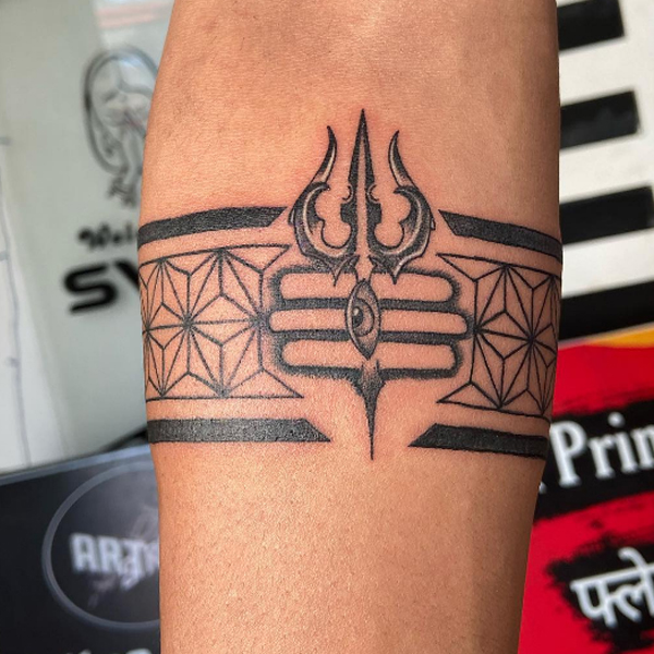 Black geometrical armband with trishul design tattoo
