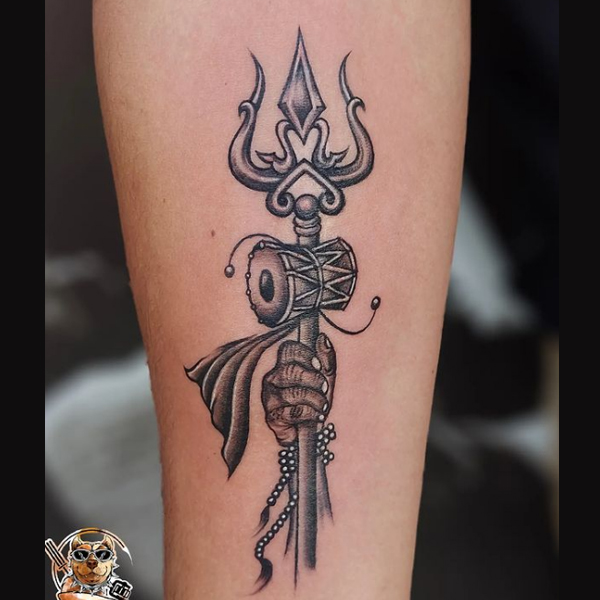 Awesome trishul in hand of Lord Shiva