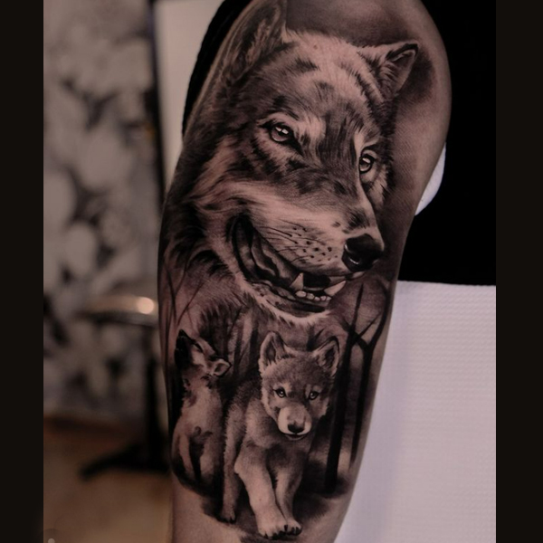 Dashing Wolf family sleeve tattoo