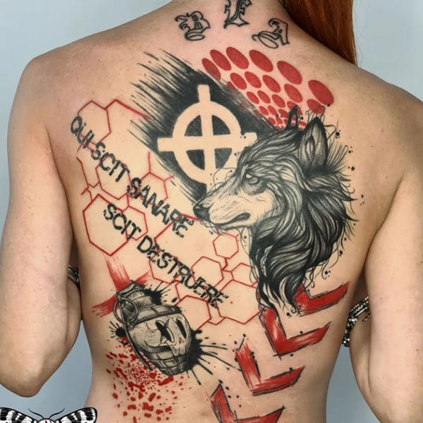 A large trash polka wolf pattern tattoo